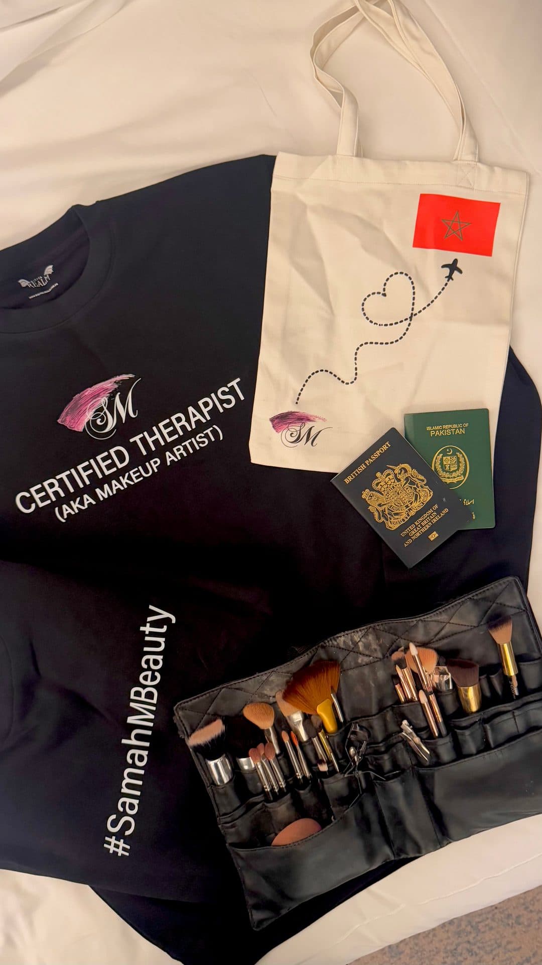 Samah's travel kit — tee, Morocco tote, passports and brush roll