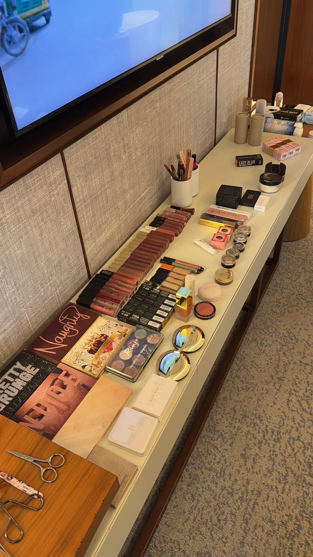 Samah's organized makeup kit spread out and ready